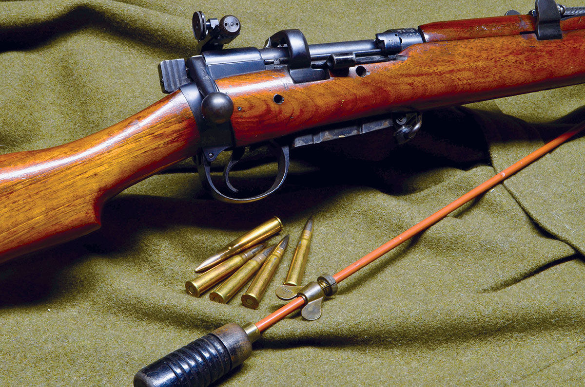 Lee-Enfield No. 1, Mk. III with original Parker-Hale cleaning rod and Canadian .303 match ammunition from the 1940s.